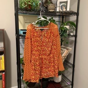 Red and yellow sheer blouse